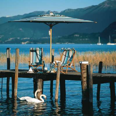 Klassiker Sonnenschirm Weish�upl am Strand