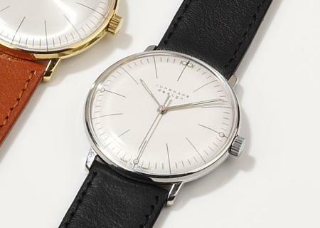 Max Bill Armbanduhr 1962 mechanisch Strichblatt weiß / Leder schwarz von Junghans Max Bill Armbanduhr 1962 mechanisch Strichblatt weiß / Leder schwarz