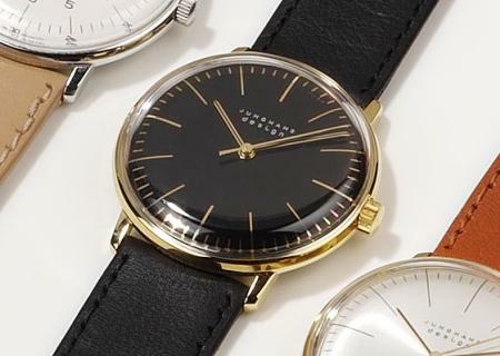 Max Bill Armbanduhr 1962 mechanisch Strichblatt schwarz / Schließe vergoldet / Leder schwarz von Junghans Max Bill Armbanduhr 1962 mechanisch Strichblatt schwarz / Schließe vergoldet / Leder schwarz