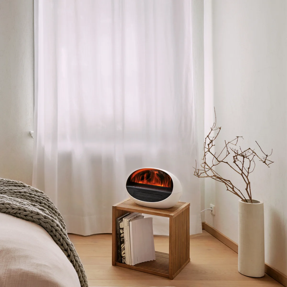 ERIK Elektrokamin mit Heizlüfter und Aroma Diffuser von Stadler Form ERIK Elektrokamin mit Heizlüfter und Aroma Diffuser